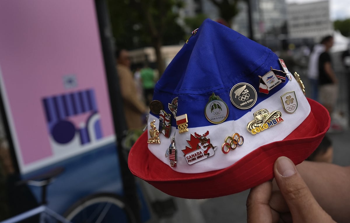The tradition, which started with simple badges in 1896, now includes intricate and highly sought-after designs.  - AP